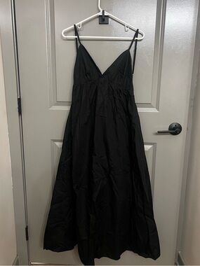 Commense coastal cowgirl, open back black dress